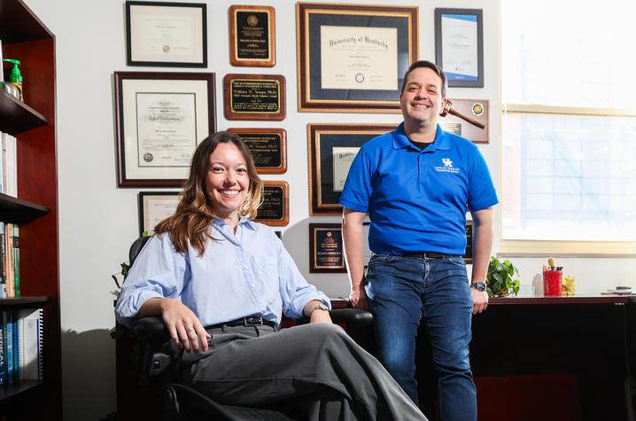 a graduate student and a professor in an office